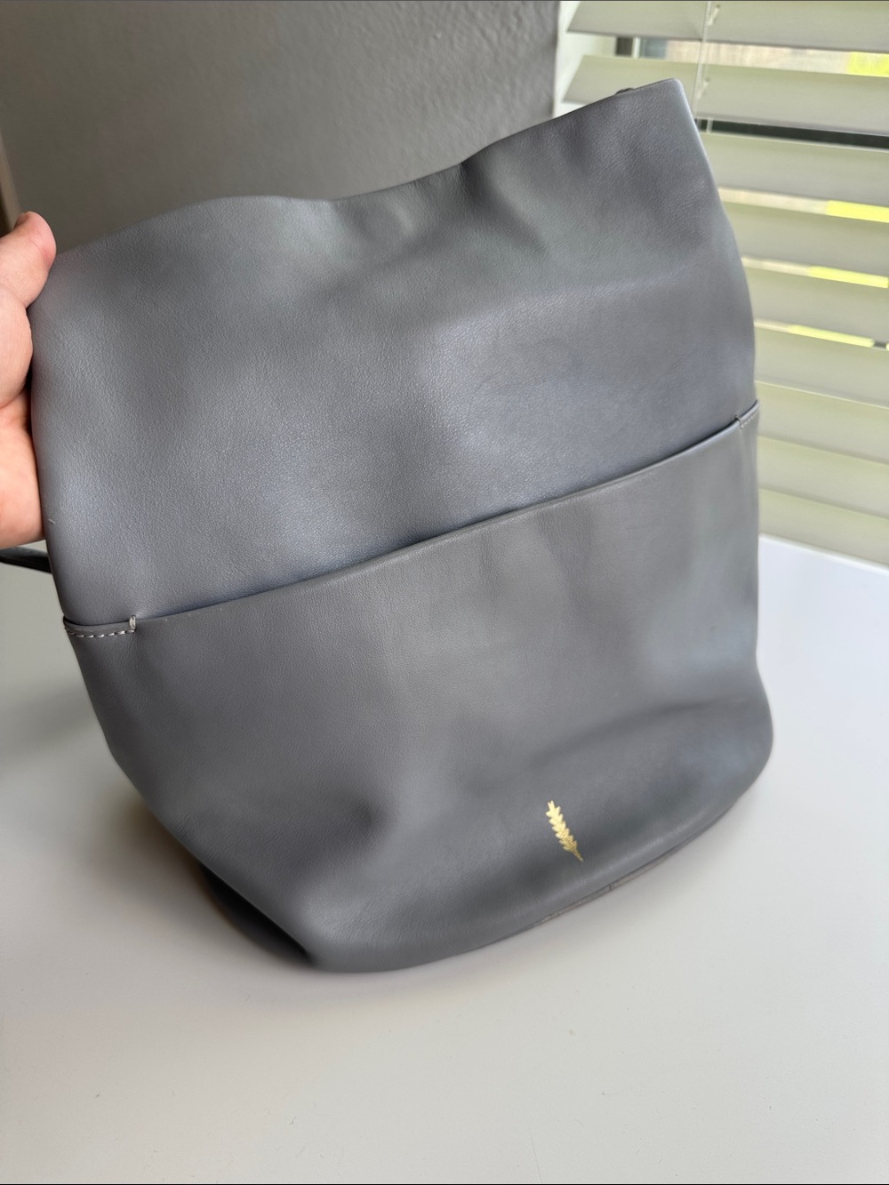 Grey Leather Crossbody Bag with Gold Accent